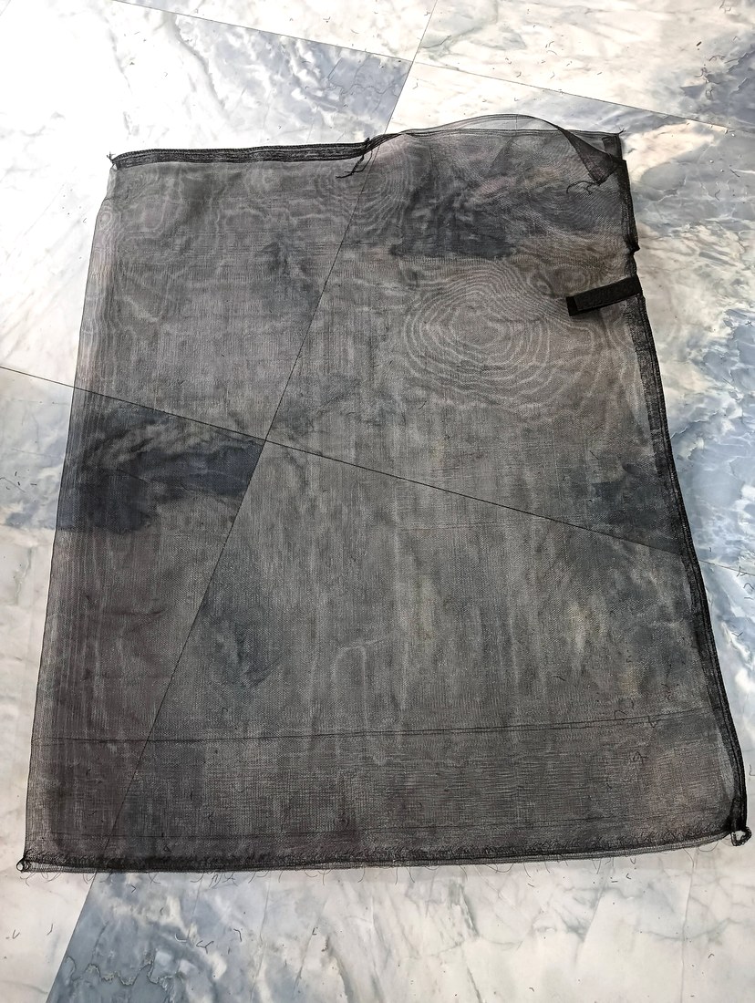 Black breathable mesh date palm protection bag with Velcro closure for date bunch protection