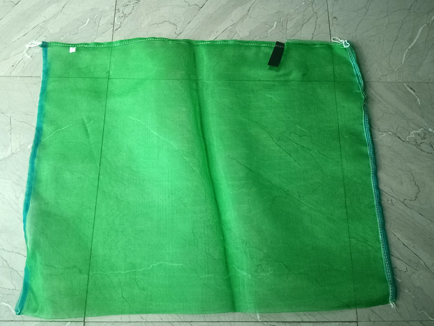 Green breathable mesh date palm protection bag with Velcro closure for agricultural harvest protection